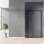 front-view-stylish-black-elevator-business-center-area-with-light-wooden-floor-tree-metal-flowerpot-big-window-with-city-view-3d-rendering_670147-24645